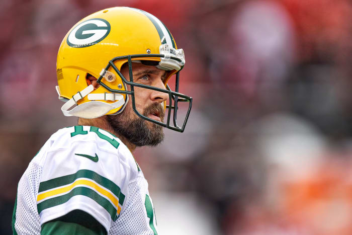 Aaron Rodgers looks to the stands during a break in the action of a Packers game.